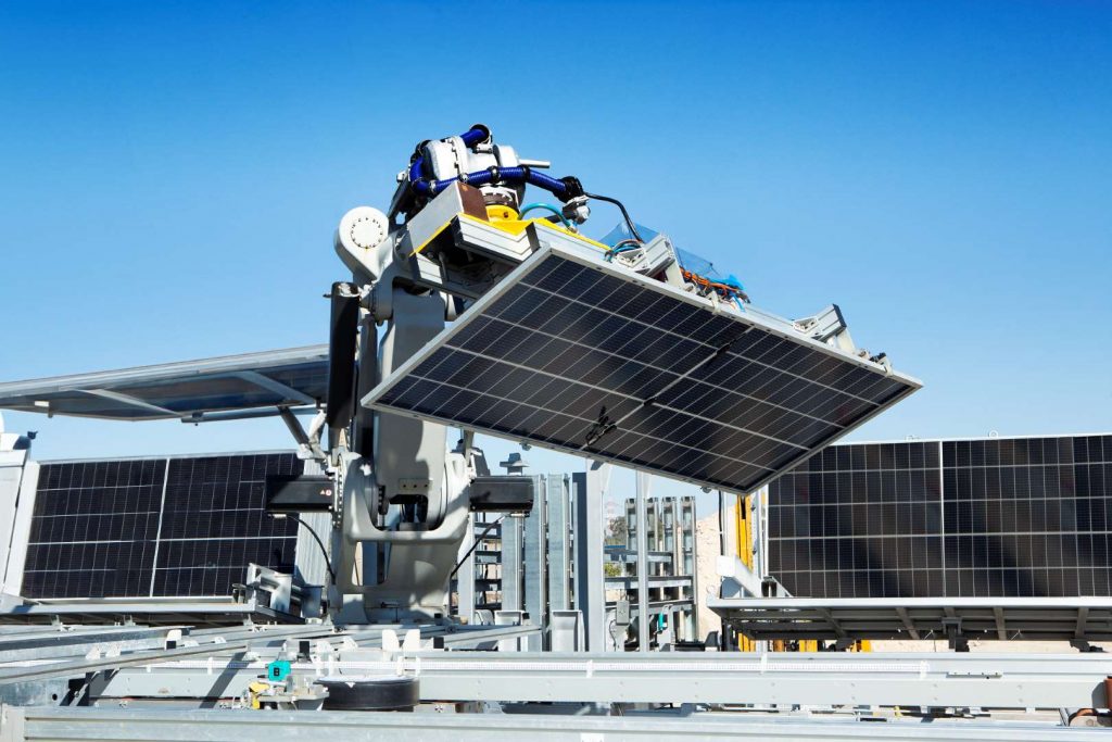 comau robot in the solar panel installation filed
